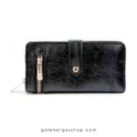 کیف پول زنانه چرم مشکی با جیب زیپی و قفل دکمه‌ای